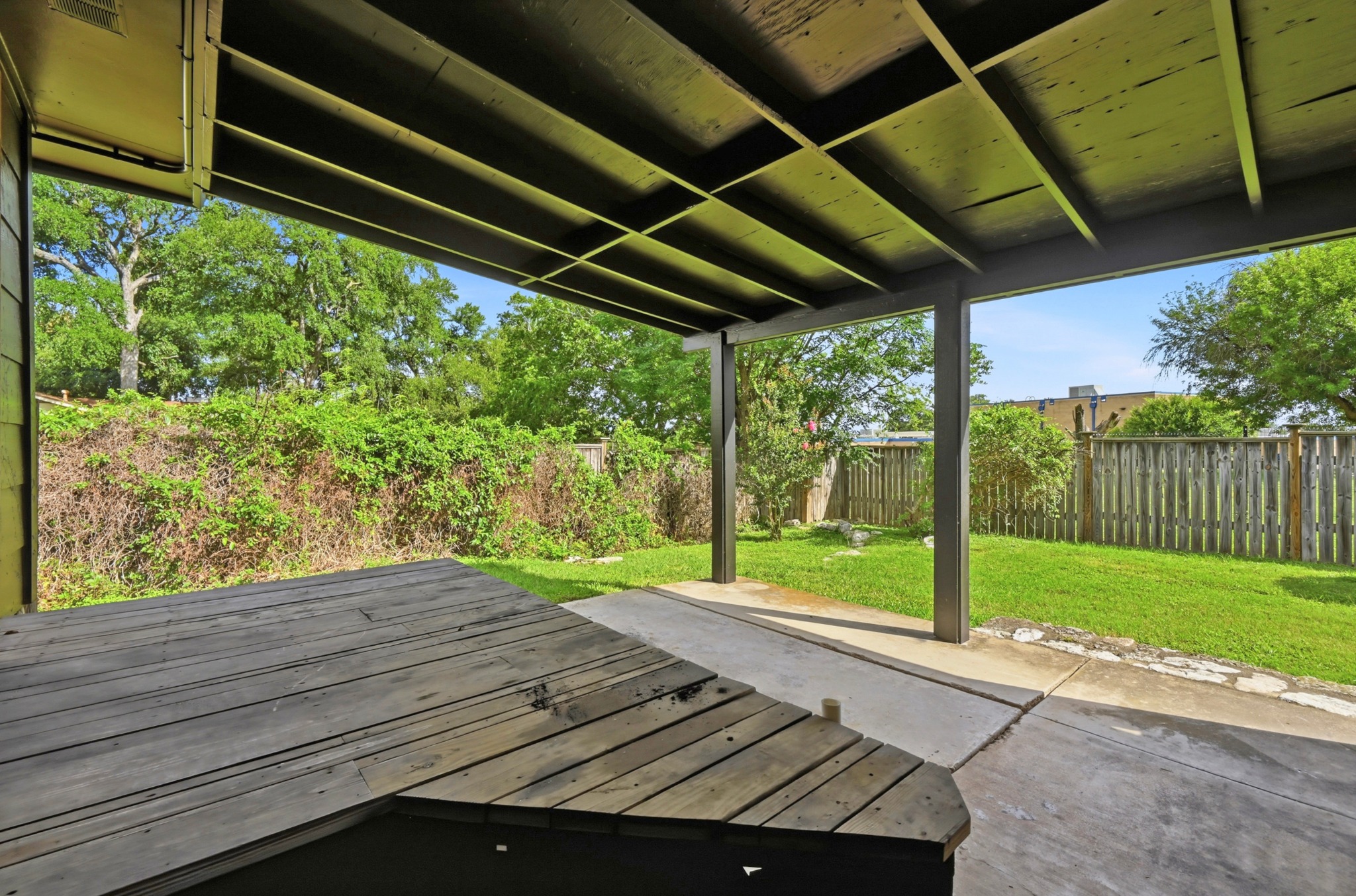 10504 Hard Rock Road Austin, TX 78750 - Photo 23 of 28 A spacious covered patio provides a delightful outdoor living space.