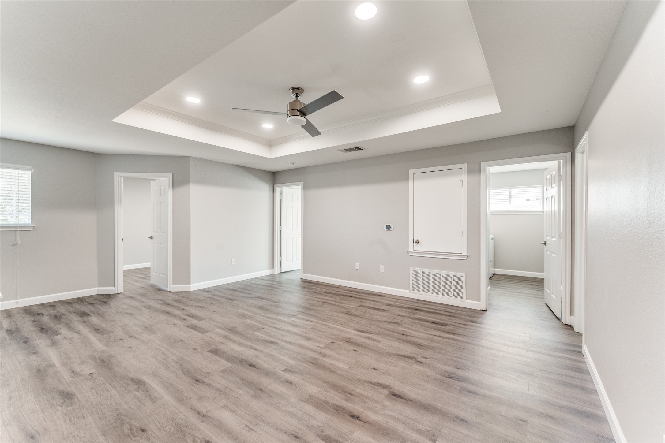 1408 Poppy Seed Lane Austin, TX 78741 - Photo 17 of 23 a view of empty room with wooden floor