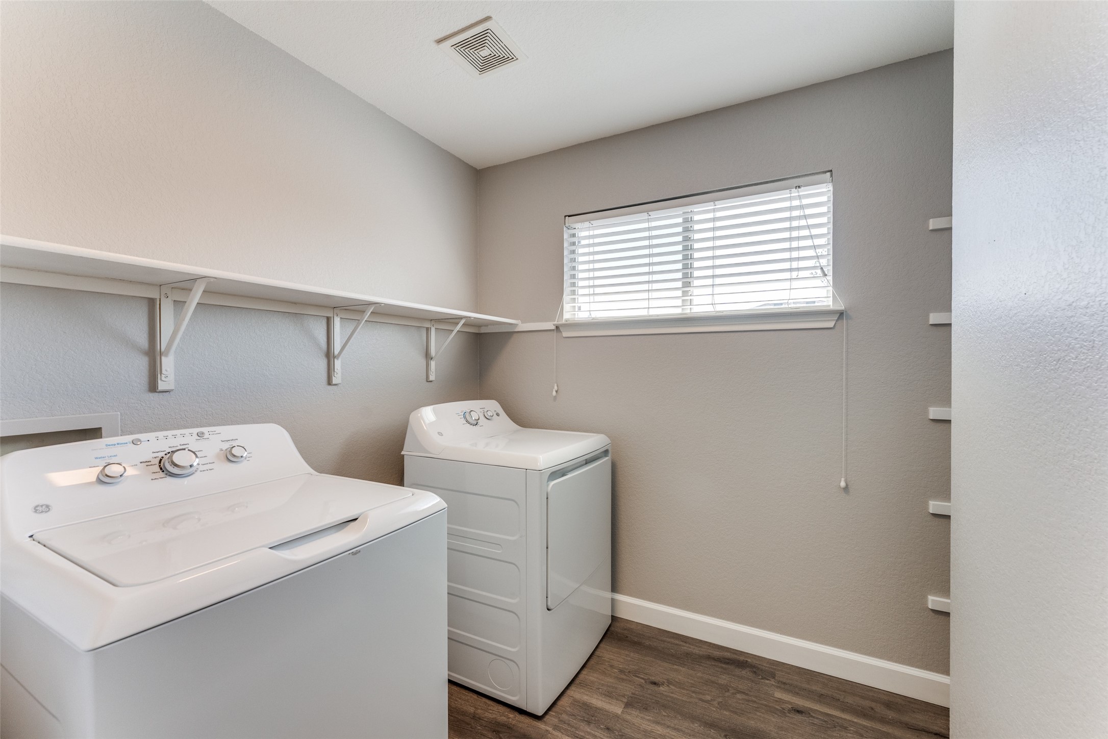 1408 Poppy Seed Lane Austin, TX 78741 - Photo 21 of 23 a utility room with dryer and washer