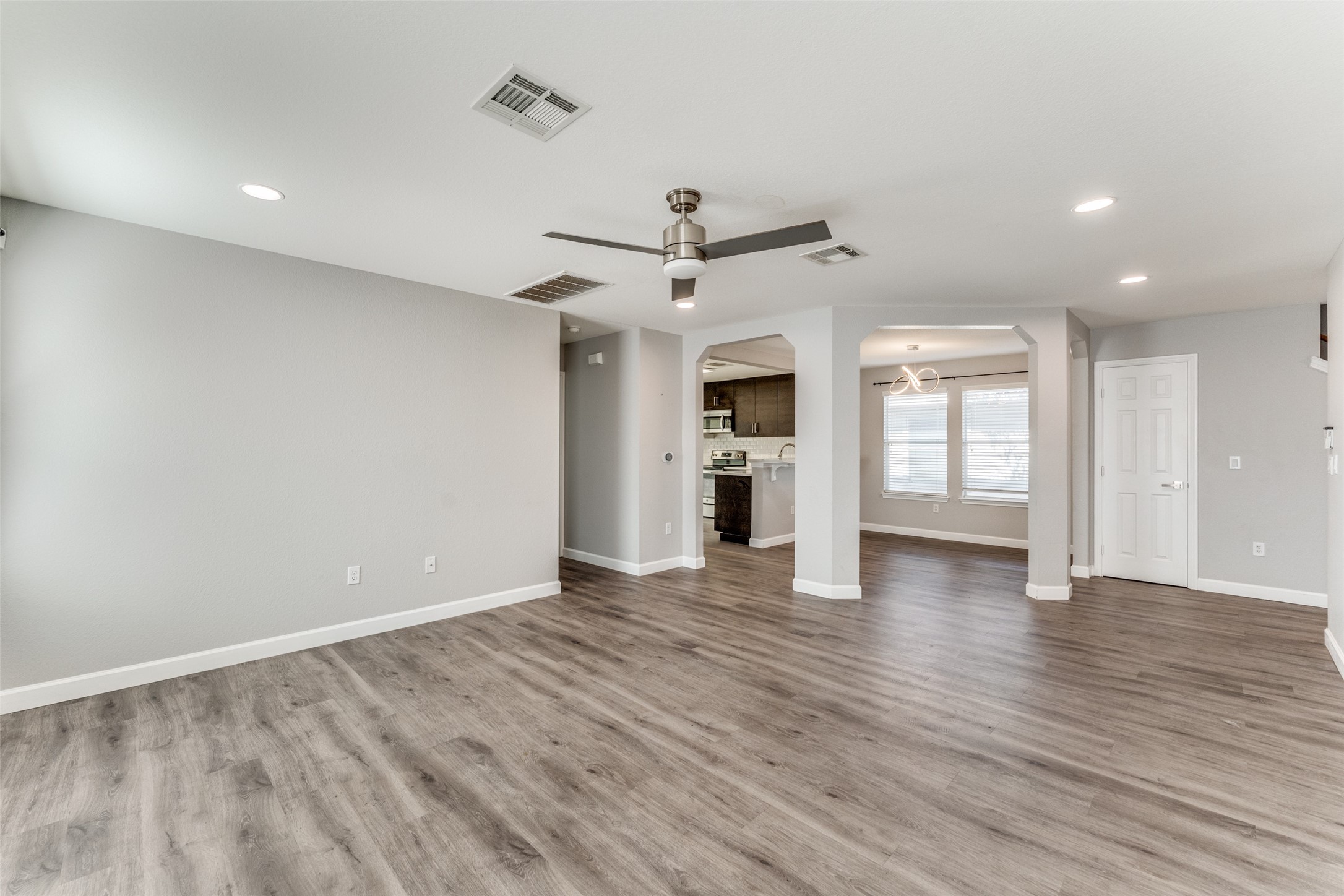 1408 Poppy Seed Lane Austin, TX 78741 - Photo 8 of 23 a view of an empty room with window and cabinet