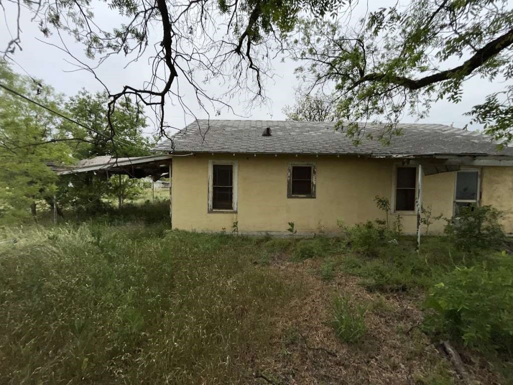 1201 Taylor Avenue Rule, TX 79547 - Photo 3 of 7 a house view with a backyard space