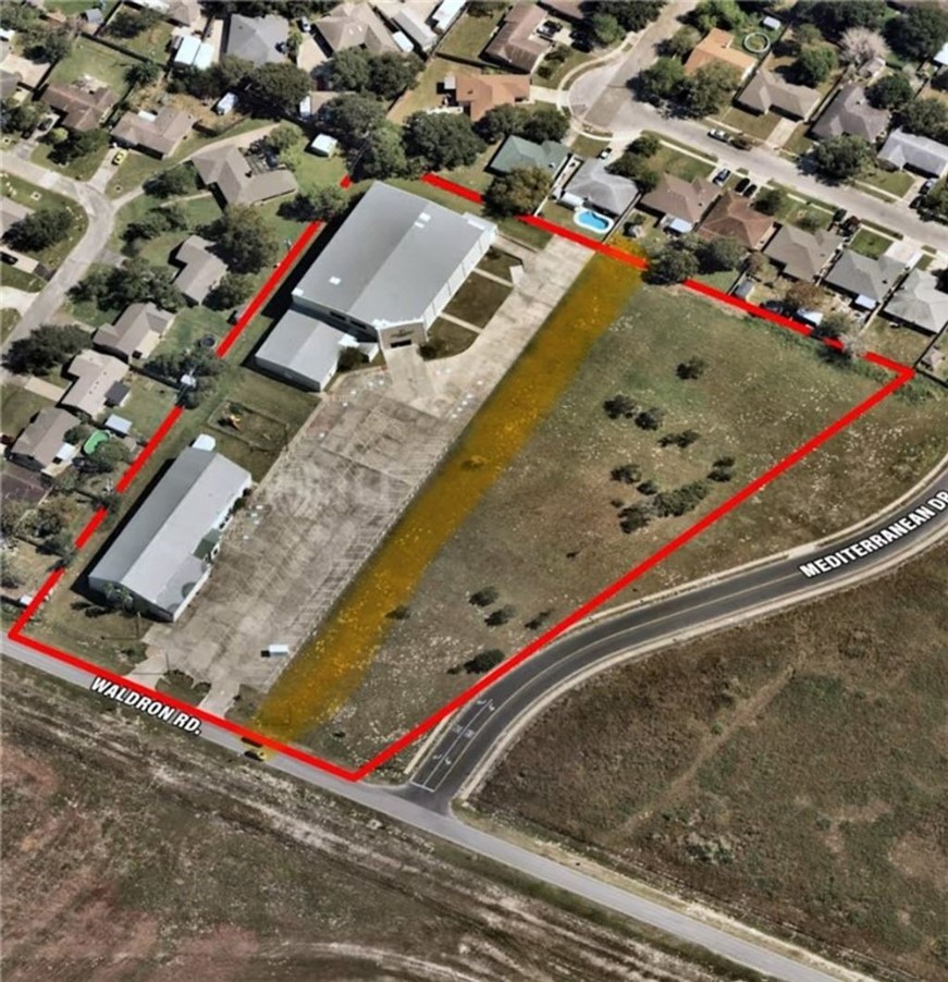 3449 Waldron Road Corpus Christi, TX 78418 - Photo 3 of 3 an outdoor space with wooden floor