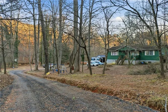 a view of backyard with trees