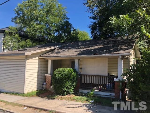 2011 Angier Avenue Durham, NC 27703 - Photo 4 of 15 a view of a house with a yard and plants
