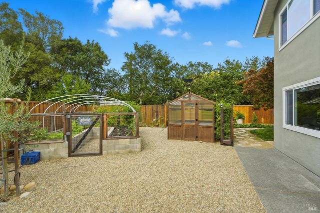 a bathroom with a shower and toilet