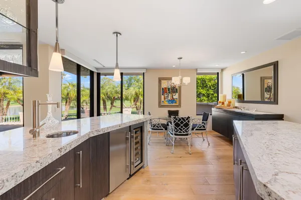 a dining room with furniture window wooden floor