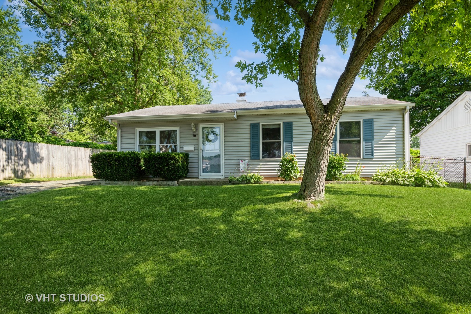 16 East Oltendorf Road Streamwood, IL 60107 - Photo 1 of 18 a front view of house with yard and green space