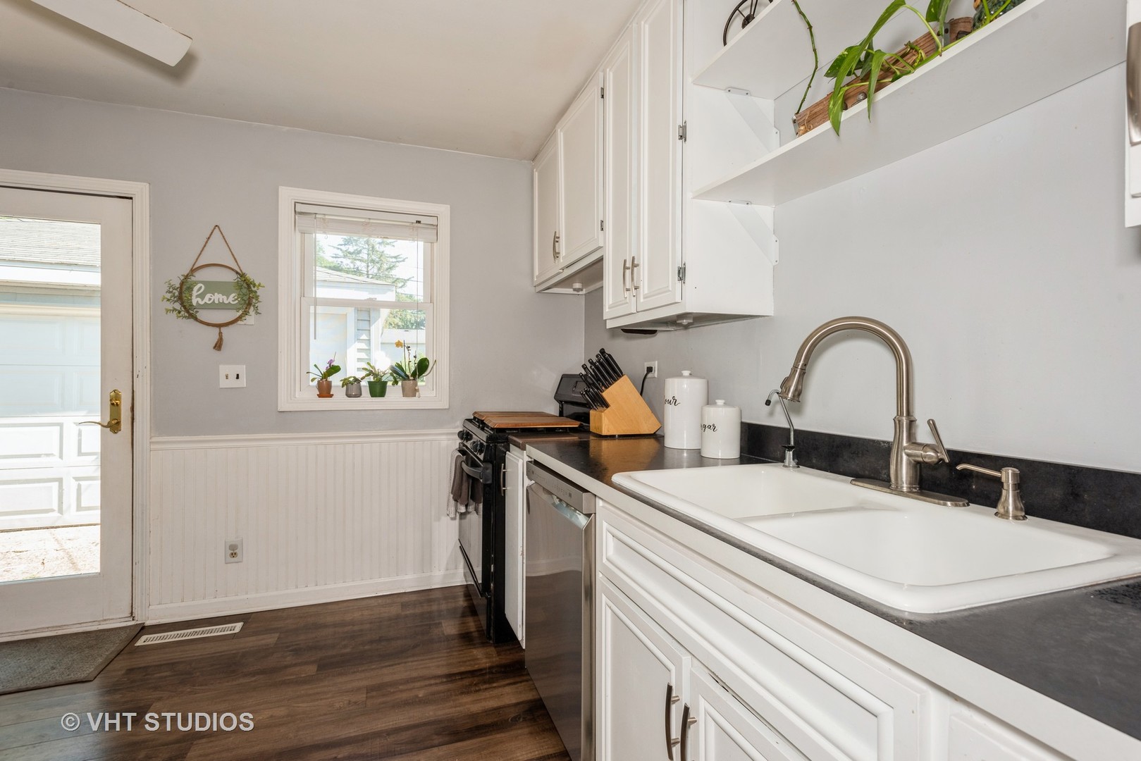 16 East Oltendorf Road Streamwood, IL 60107 - Photo 13 of 18 a bathroom with a sink and a window