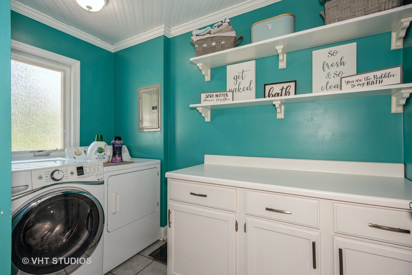 16 East Oltendorf Road Streamwood, IL 60107 - Photo 7 of 18 a utility room with dryer and washer