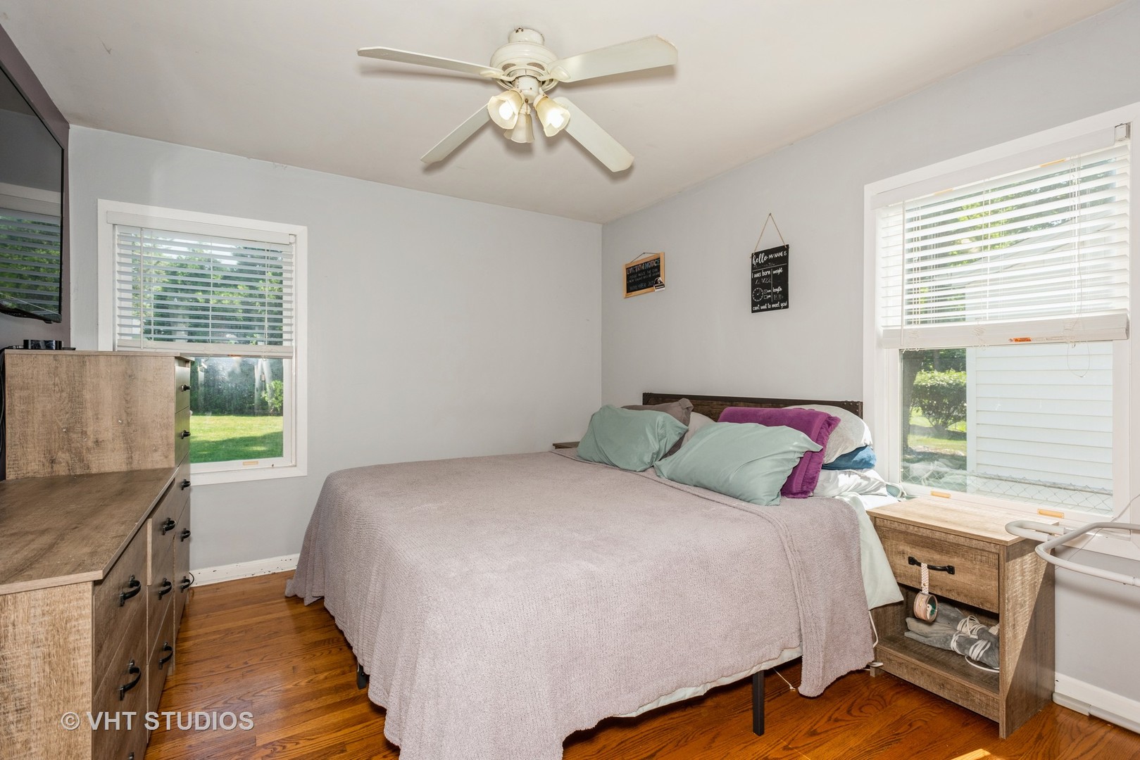 16 East Oltendorf Road Streamwood, IL 60107 - Photo 9 of 18 a bedroom with a bed dresser and a window
