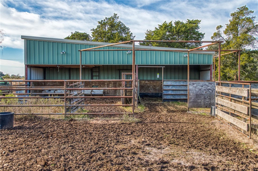 7300 Goehring Road Ledbetter, TX 78946 - Photo 15 of 21 a view of a house with a yard