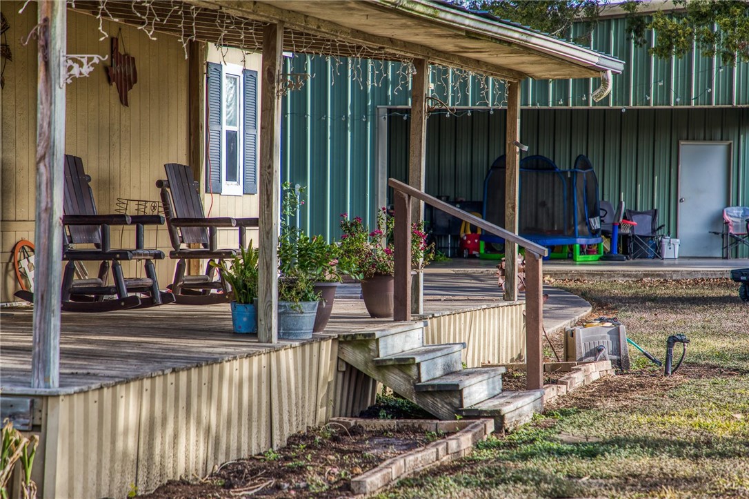 7300 Goehring Road Ledbetter, TX 78946 - Photo 4 of 21 a view of house with a swimming pool