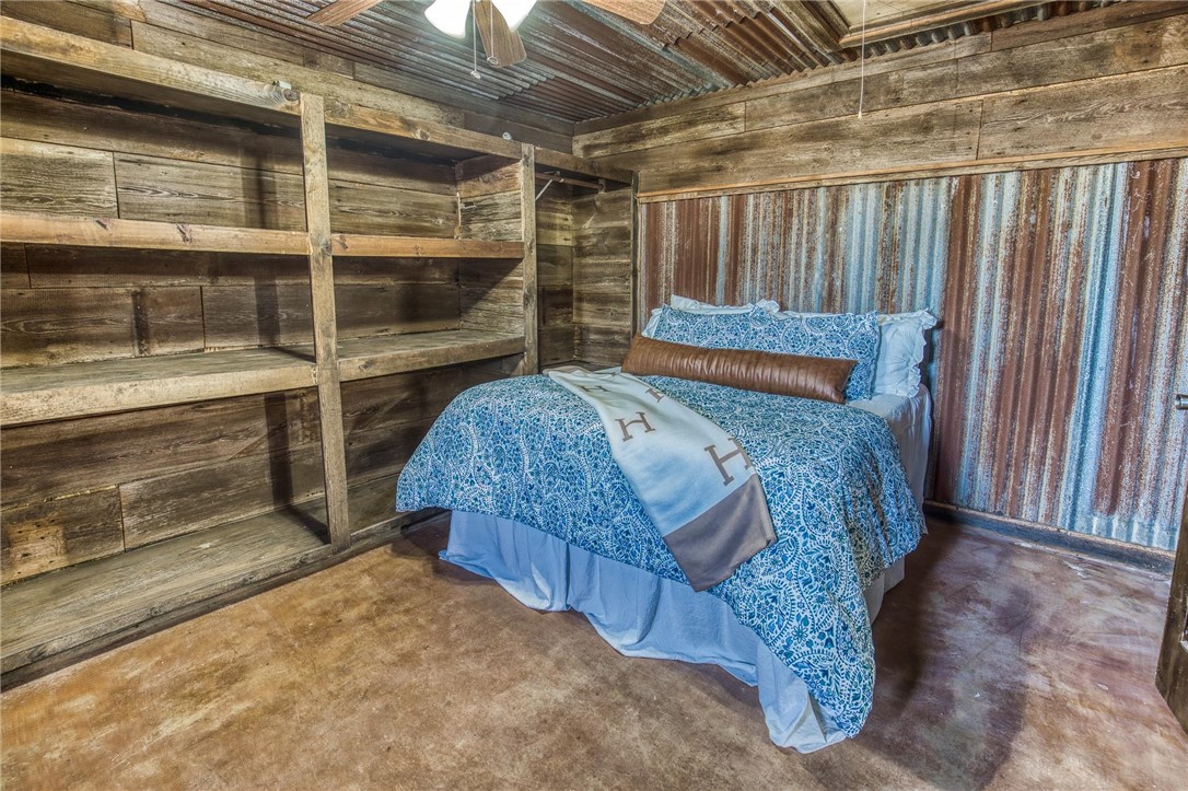 7300 Goehring Road Ledbetter, TX 78946 - Photo 8 of 21 a bed room with a bed and a window