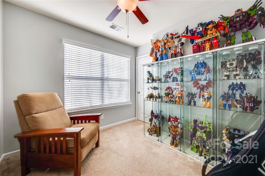 313 Sandy Spring Lane, Unit 93 Clover, SC 29710 - Photo 22 of 36 a living room filled with furniture and a window