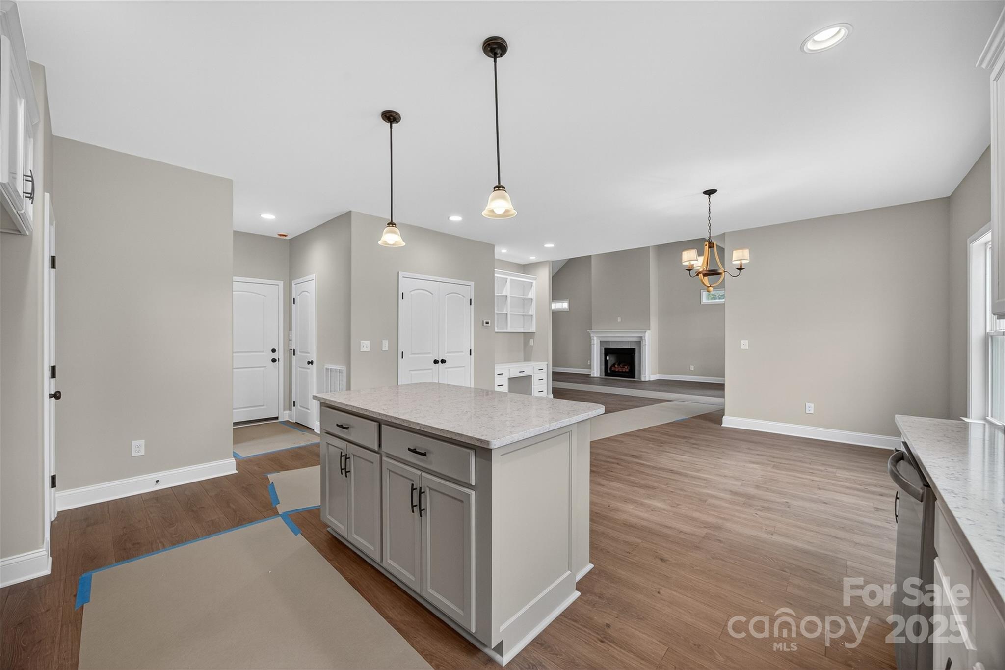 7195 Mooresville Road Salisbury, NC 28147 - Photo 15 of 38 a large kitchen with stainless steel appliances a large center island in it