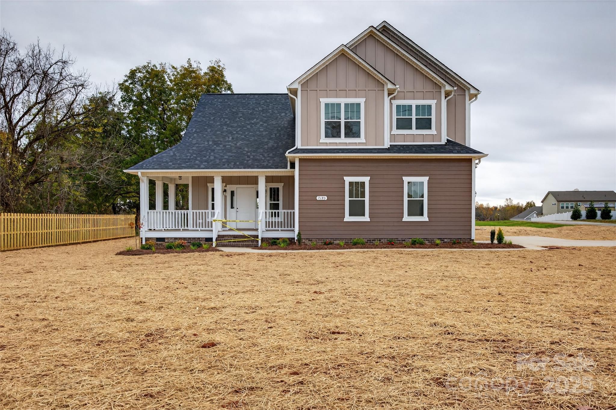7195 Mooresville Road Salisbury, NC 28147 - Photo 2 of 38 a front view of a house with a yard