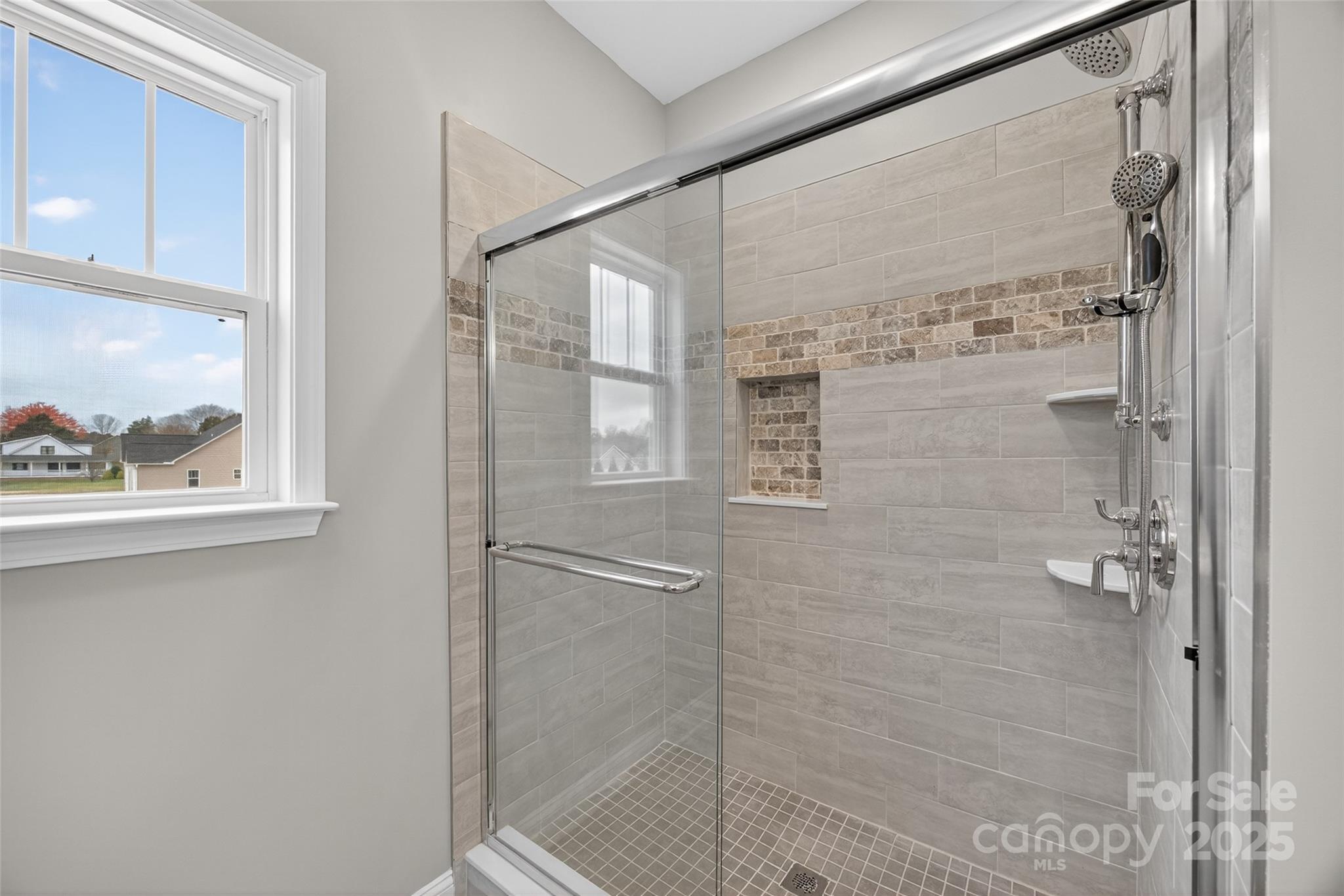 7195 Mooresville Road Salisbury, NC 28147 - Photo 22 of 38 a bathroom with a shower