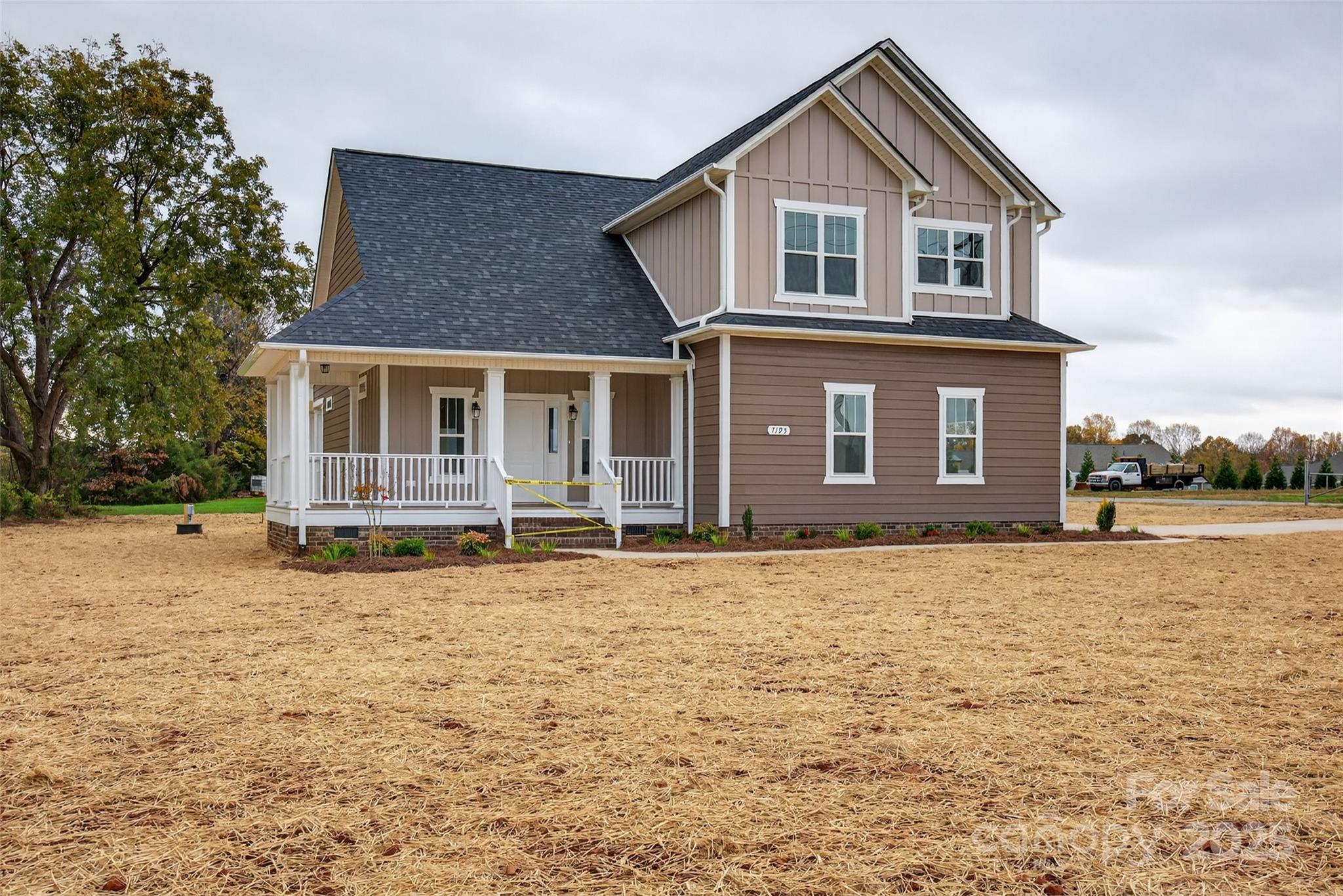 7195 Mooresville Road Salisbury, NC 28147 - Photo 3 of 38 a front view of a house with a yard