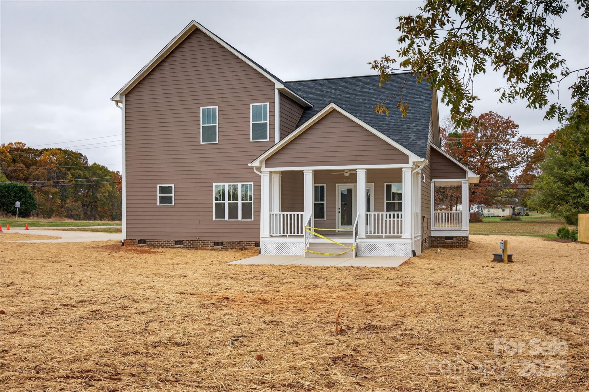 7195 Mooresville Road Salisbury, NC 28147 - Photo 34 of 38 a front view of a house with a yard