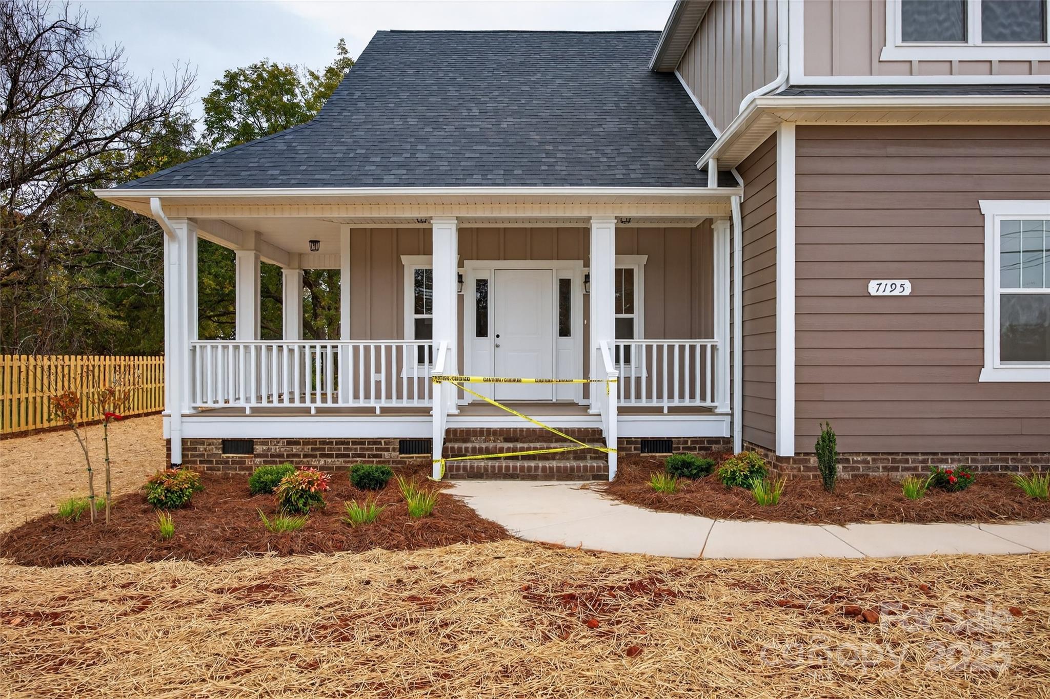 7195 Mooresville Road Salisbury, NC 28147 - Photo 6 of 38 a front view of a house with a yard