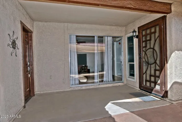 a view of a room with a large window