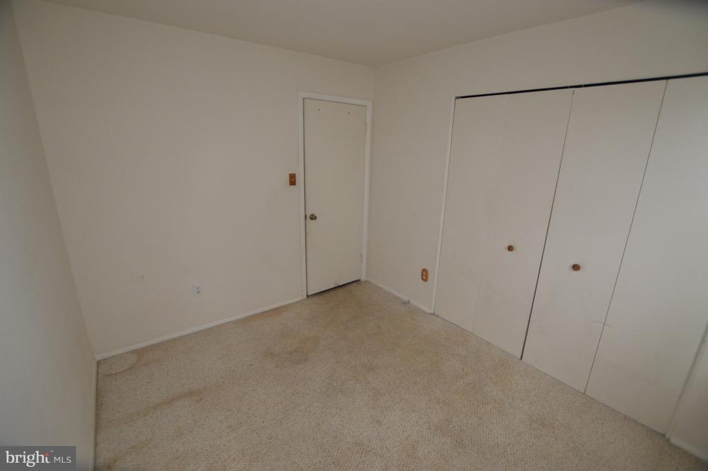 7972 Tick Neck Road Pasadena, MD 21122 - Photo 17 of 19 a view of an empty room