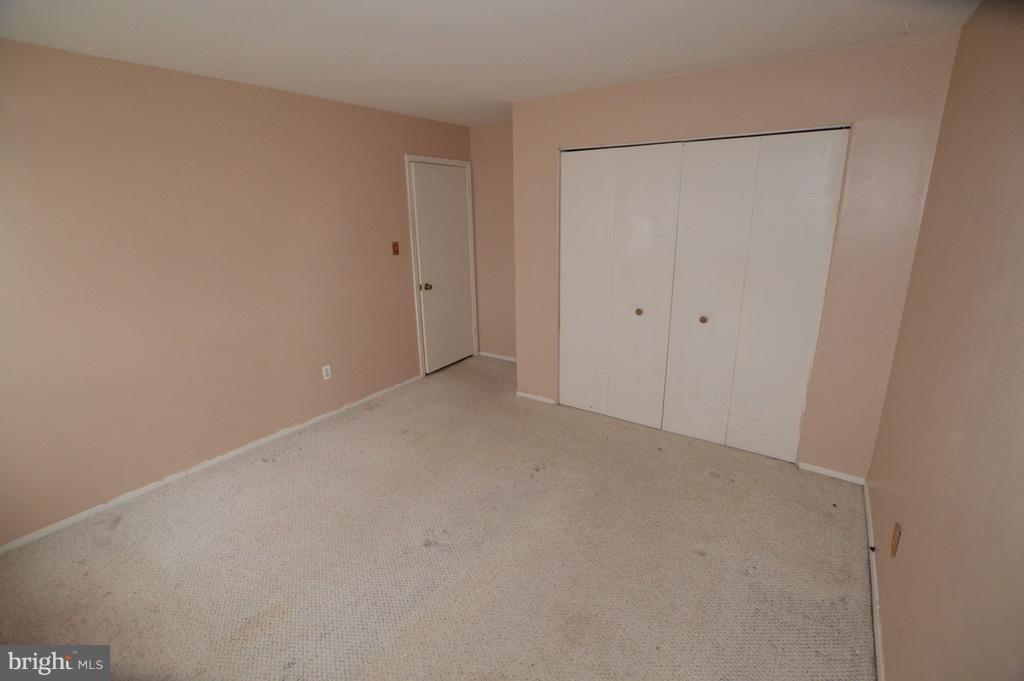 7972 Tick Neck Road Pasadena, MD 21122 - Photo 9 of 19 a view of an empty room