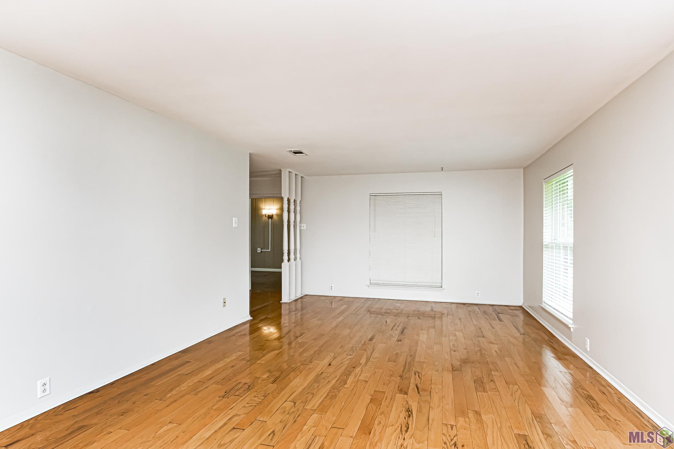 10386 Rhapsody Drive Baton Rouge, LA 70815 - Photo 11 of 21 Den/Dining Combo