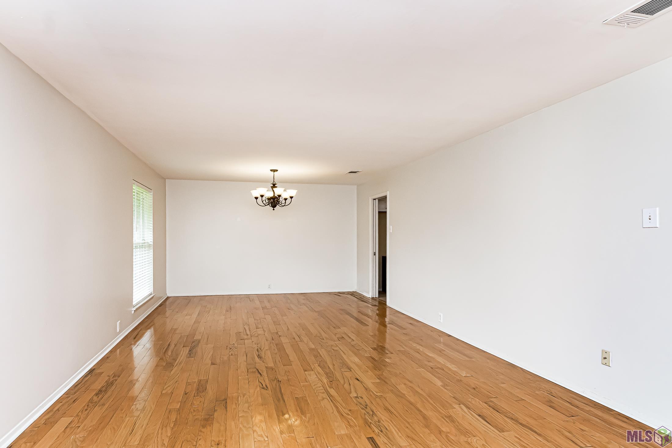 10386 Rhapsody Drive Baton Rouge, LA 70815 - Photo 10 of 21 Den/Dining Combo
