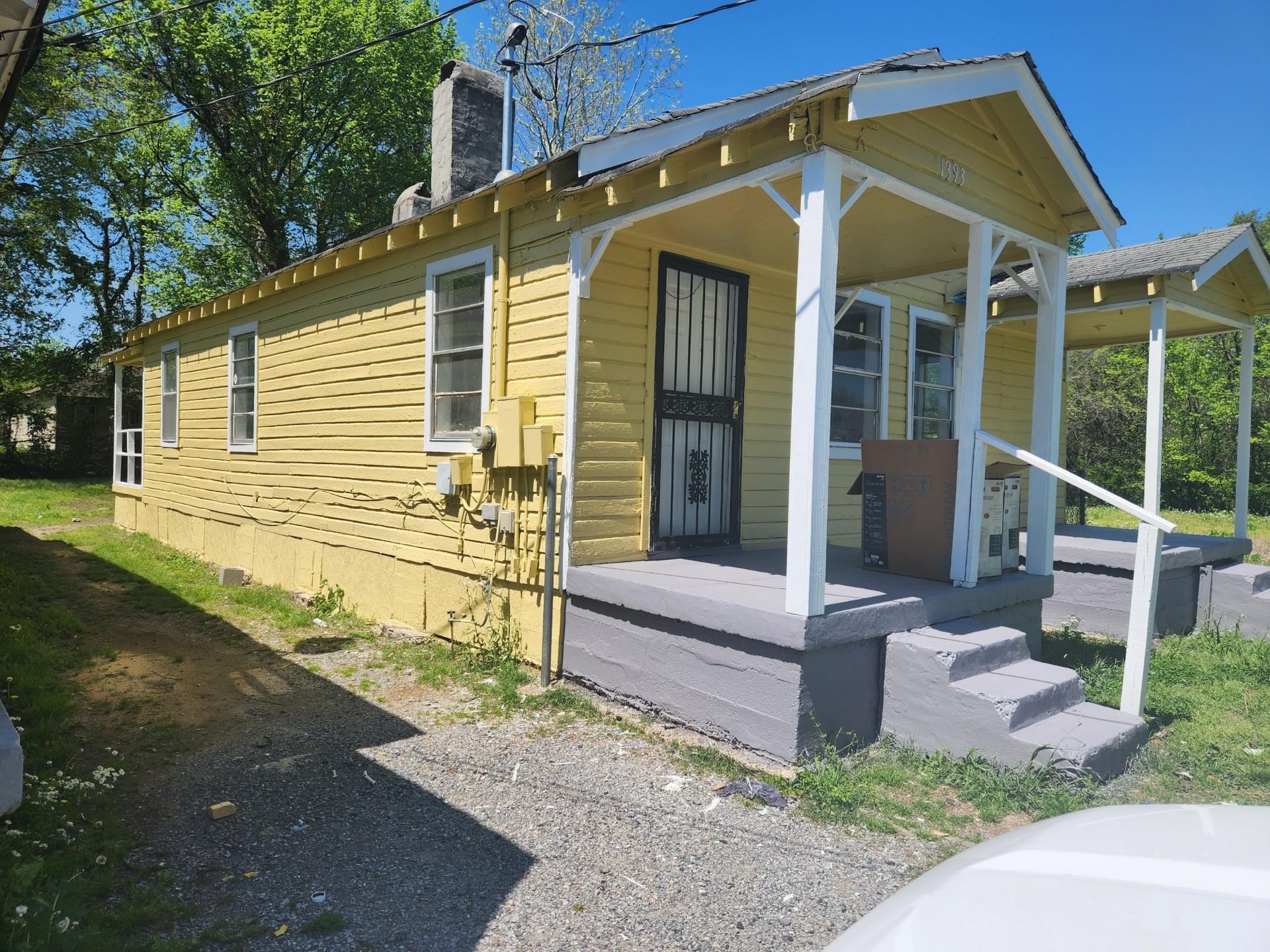 1393 Michigan Street Memphis, TN 38106 - Photo 1 of 27 a view of a house with a yard
