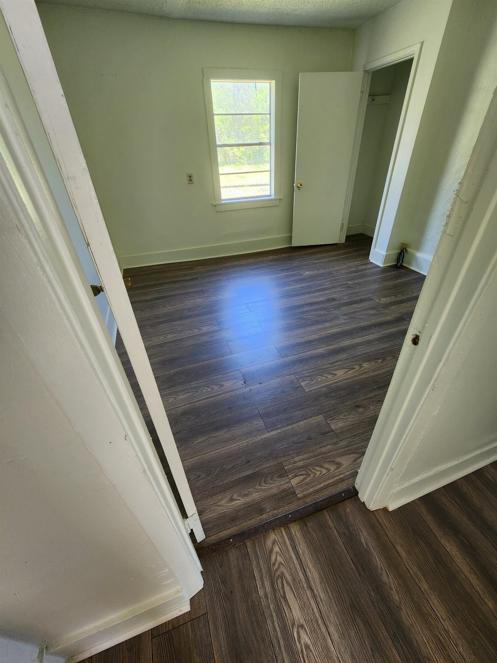 1393 Michigan Street Memphis, TN 38106 - Photo 6 of 27 a view of wooden floor in an empty room