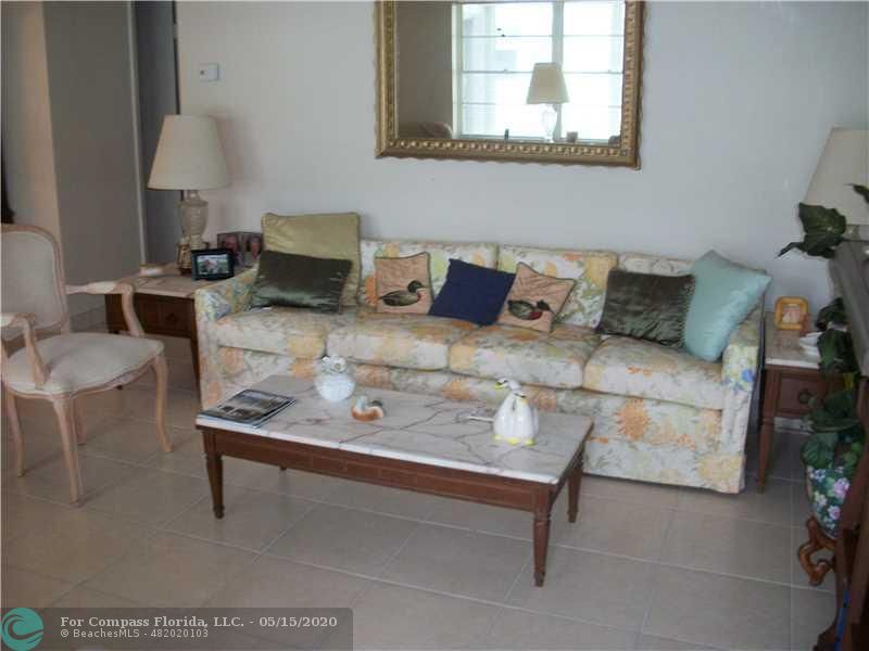 2100 Northeast 38th Street, Unit 135 Lighthouse Point, FL 33064 - Photo 3 of 13 Living Room