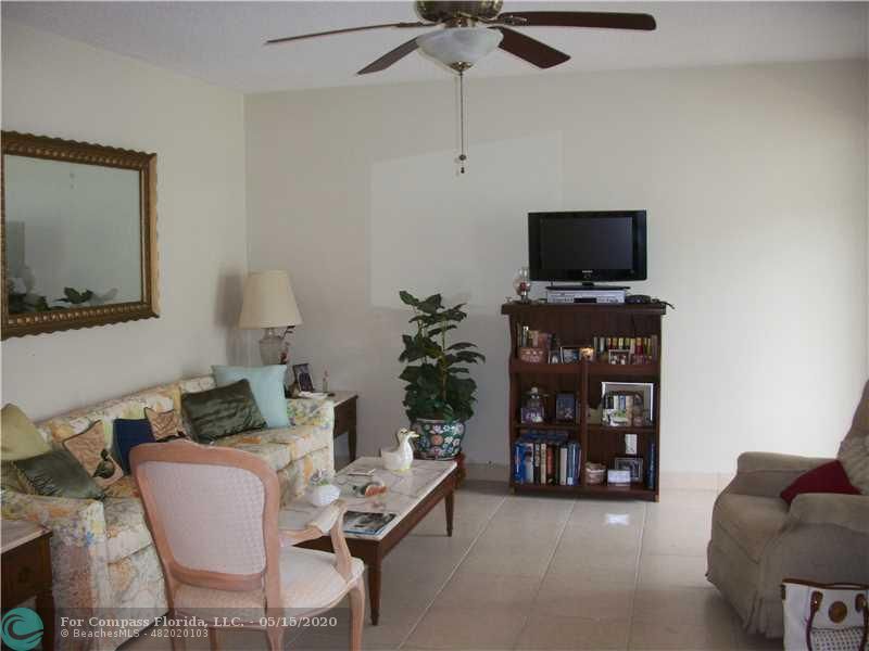 2100 Northeast 38th Street, Unit 135 Lighthouse Point, FL 33064 - Photo 8 of 13 Living Room