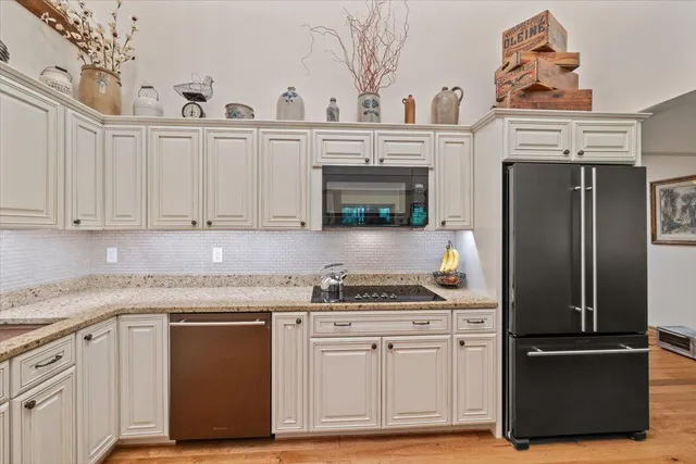 a room with a table and chairs in it