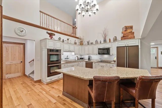 a view of a living room and dining room