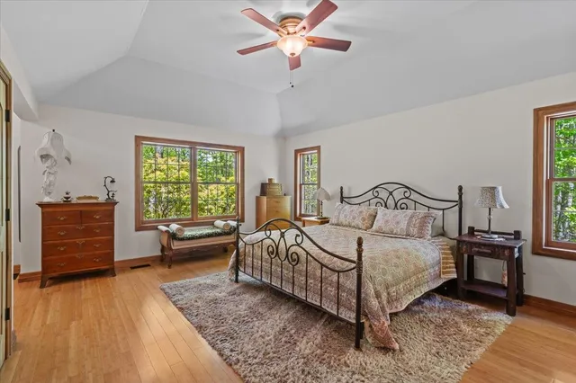a bathroom with a shower sink and mirror