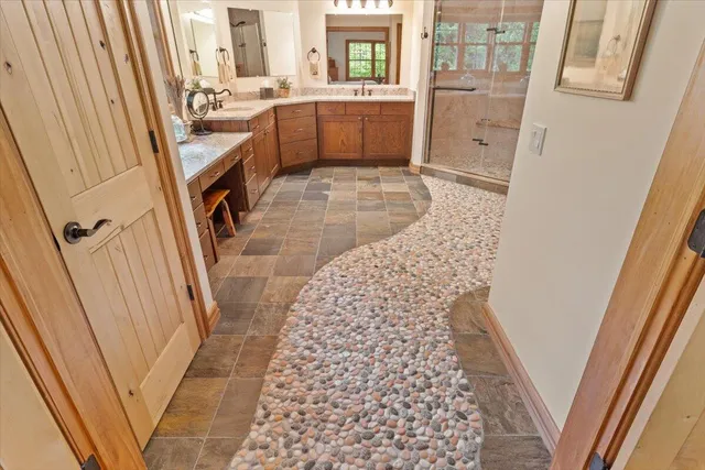 a bedroom with a bed and a cabinets