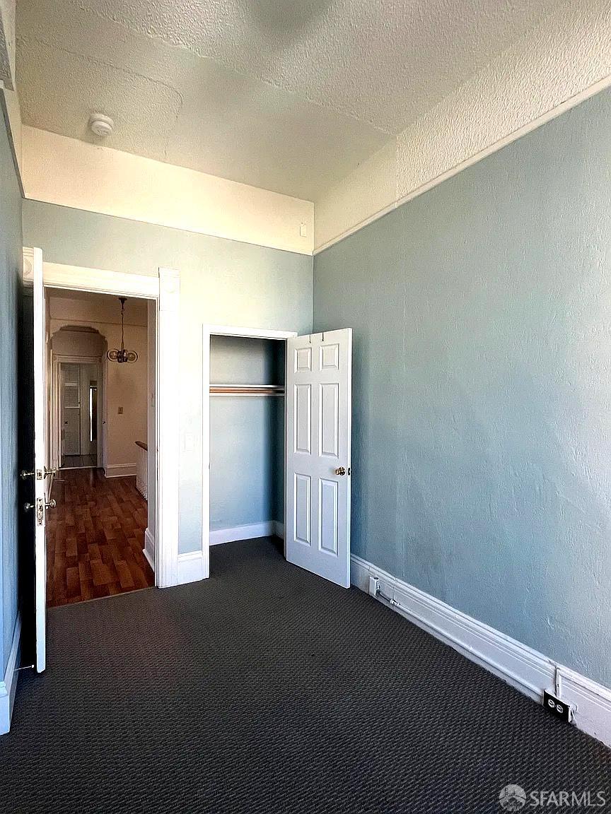 3173 21st Street San Francisco, CA 94110 - Photo 12 of 21 an empty room with closet area