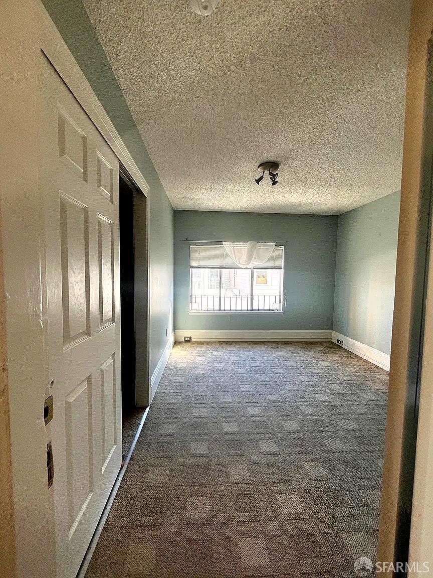 3173 21st Street San Francisco, CA 94110 - Photo 15 of 21 a view of an empty room and window