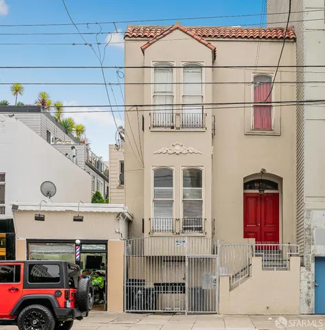 a view of a cars park in front of house