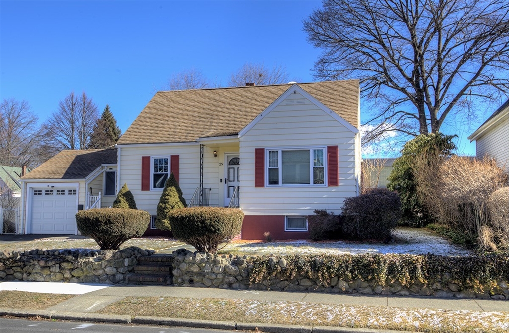 front view of house with a yard