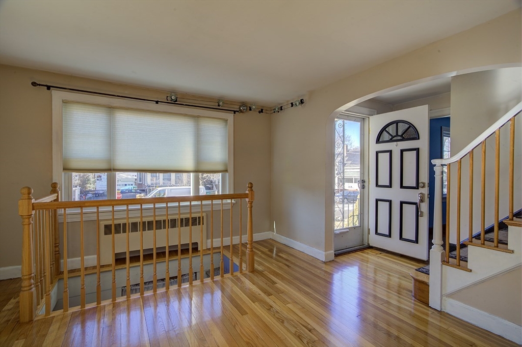 29 Perley Street Lynn, MA 01905 - Photo 13 of 27 a view of livingroom with furniture and wooden floor