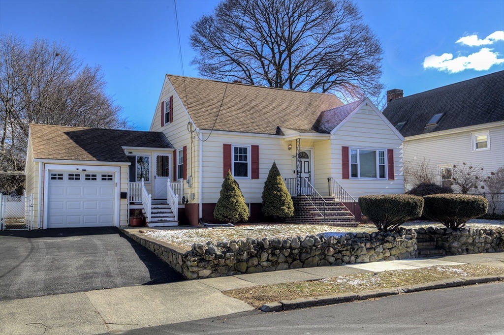 29 Perley Street Lynn, MA 01905 - Photo 2 of 27 a front view of a house with a yard