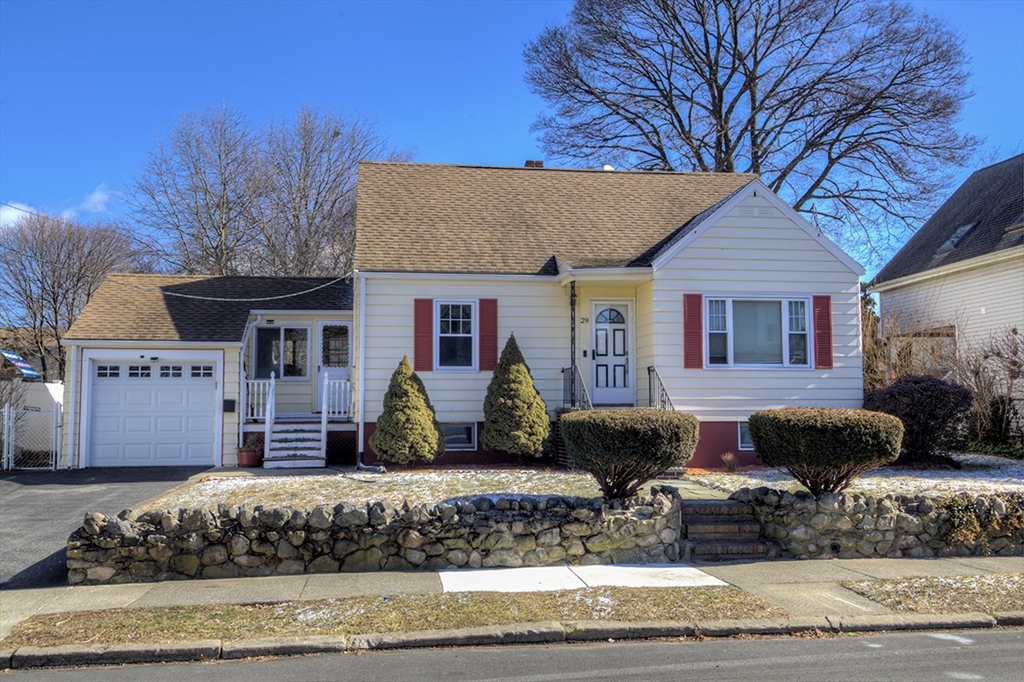 29 Perley Street Lynn, MA 01905 - Photo 3 of 27 a front view of a house with a yard