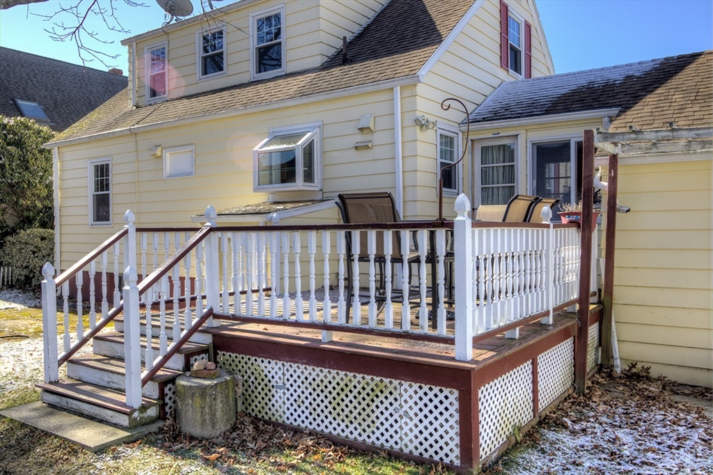 29 Perley Street Lynn, MA 01905 - Photo 6 of 27 a view of a house with wooden floor roof and wooden fence