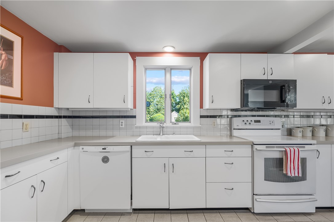 248 Wyatt Road Middletown, RI 02842 - Photo 23 of 50 Kitchen with View to Backyard