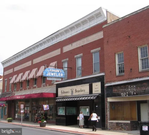 a front view of a building with street