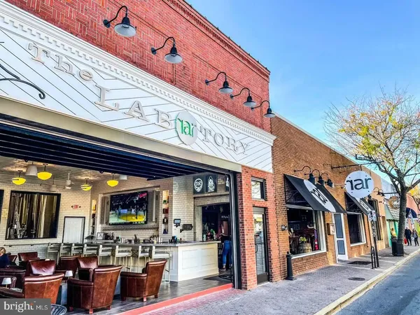 a view of a building with sitting area