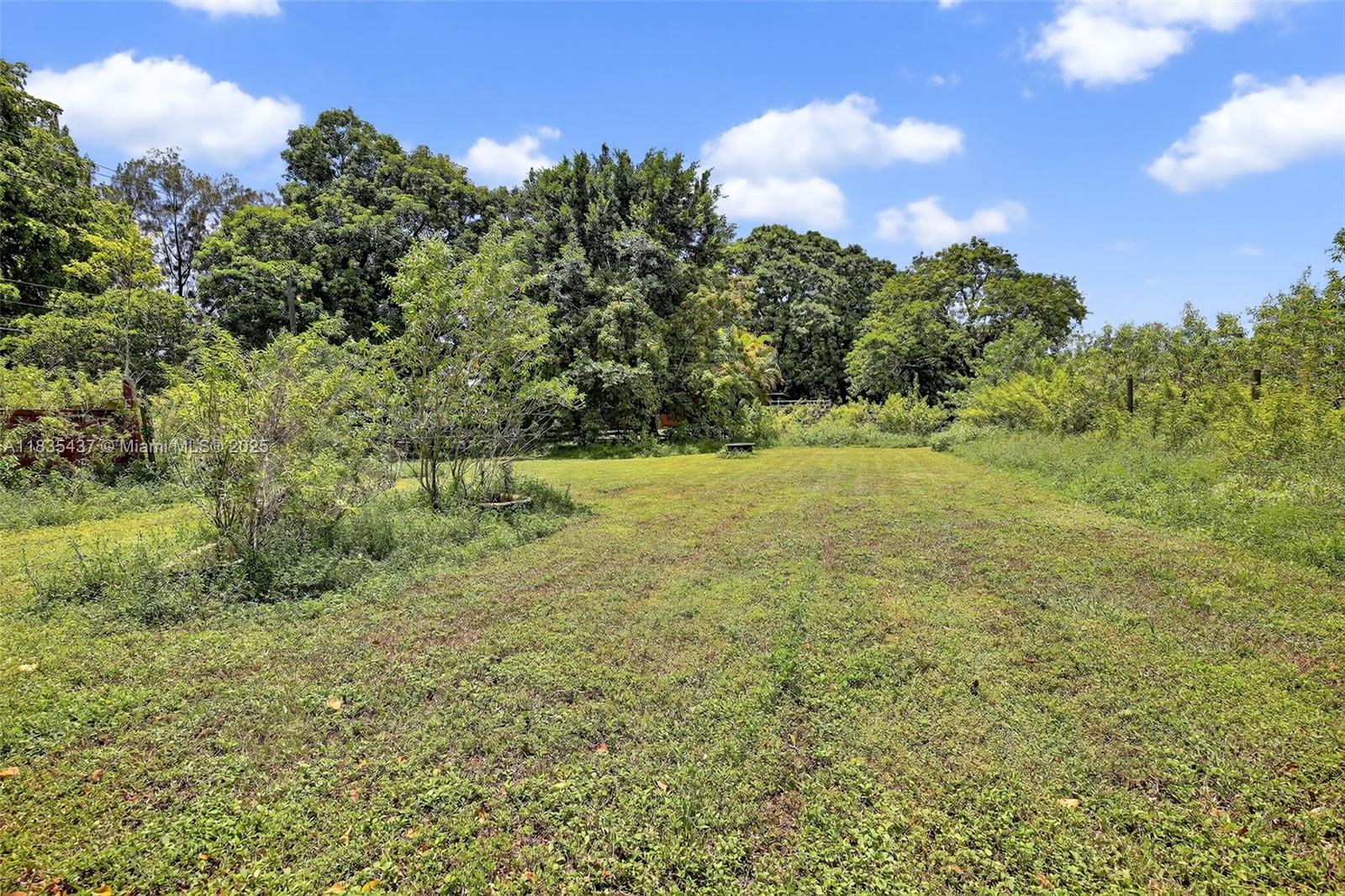 13851 Southwest 26th Street Davie, FL 33325 - Photo 23 of 48 a view of outdoor space and yard