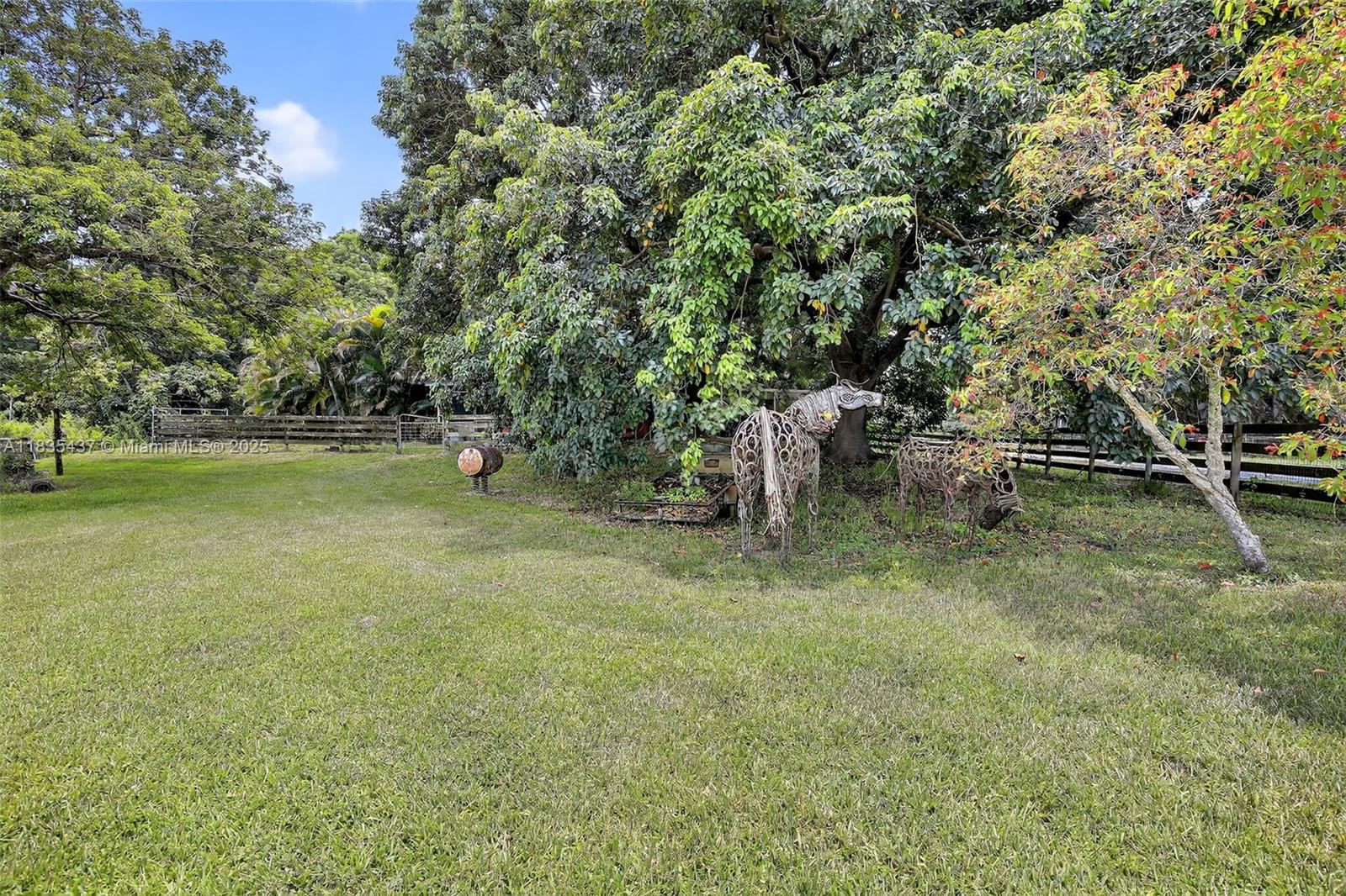13851 Southwest 26th Street Davie, FL 33325 - Photo 27 of 48 a view of outdoor space with deck and yard